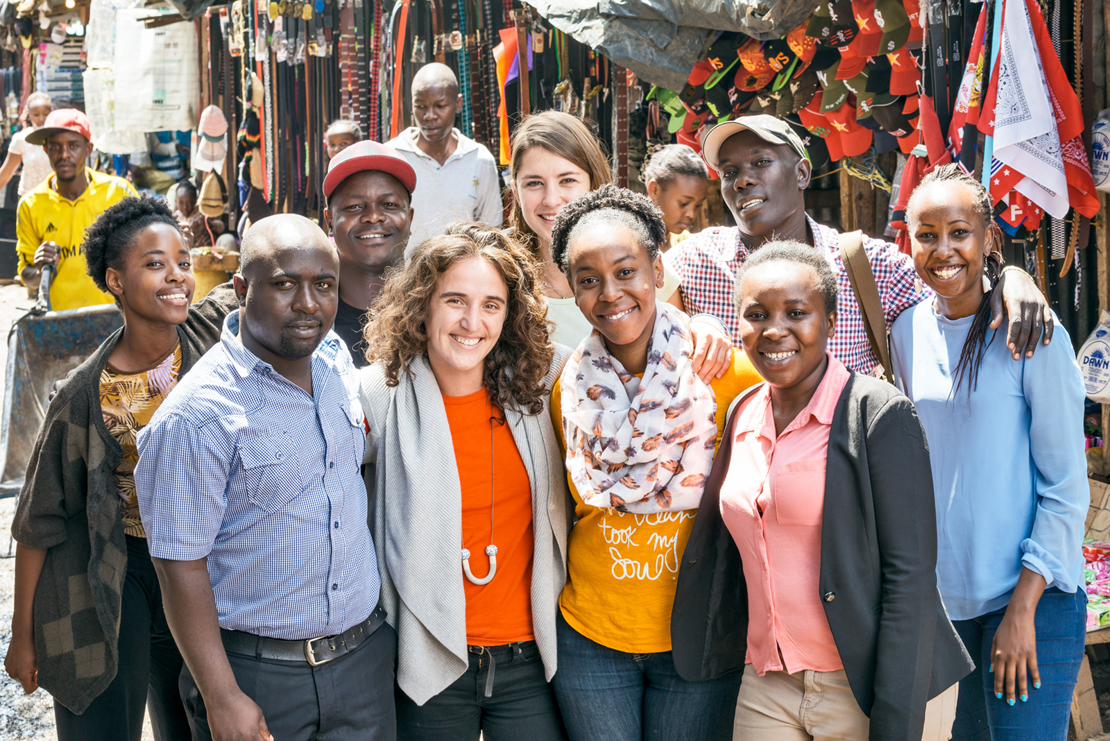 Group of people gathered to take a photo outdoors