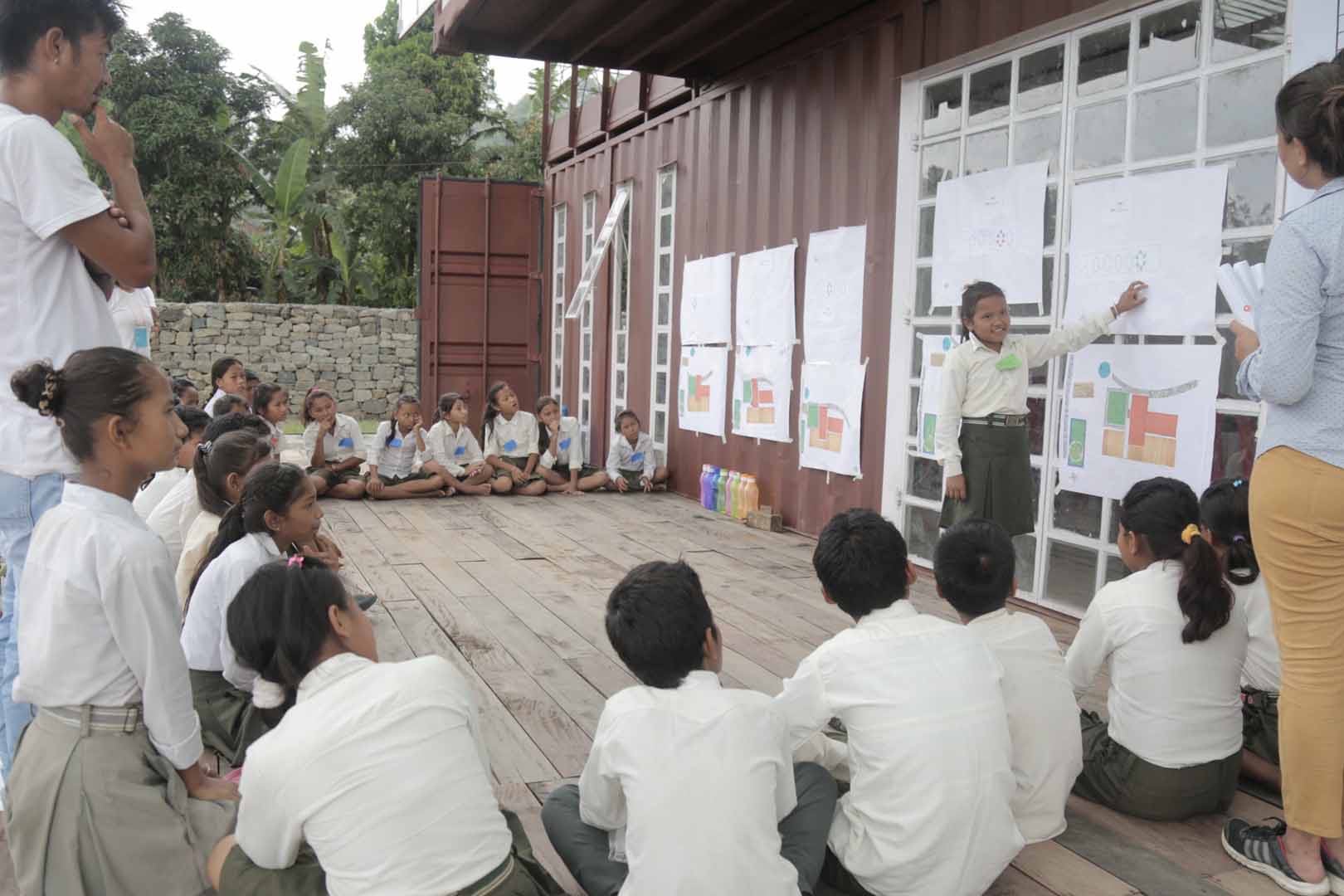 Children gathered watching a presentation